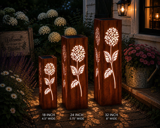 18 & 24 & 32 inch Hydrangea solar metal garden luminary set with glowing floral cutouts in a cottage garden